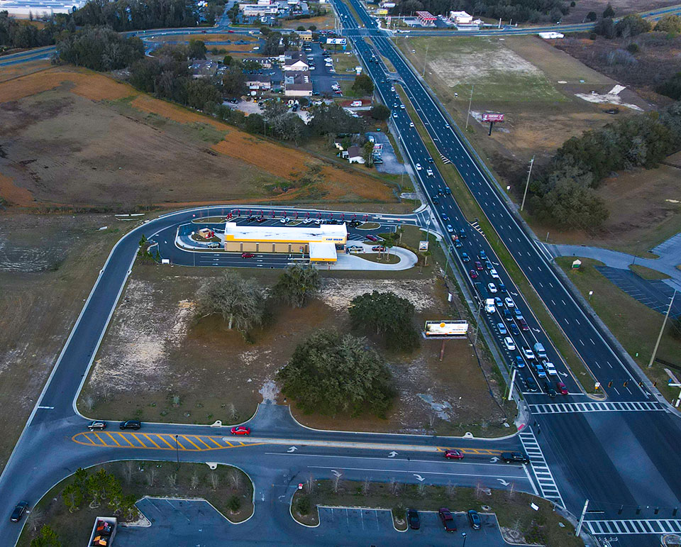 Aerial of Prime Commercial Property on SR 200 near On Top of the World Communities Ocala, FL - Parcel 1 looking east offered by Colen Built Commercial