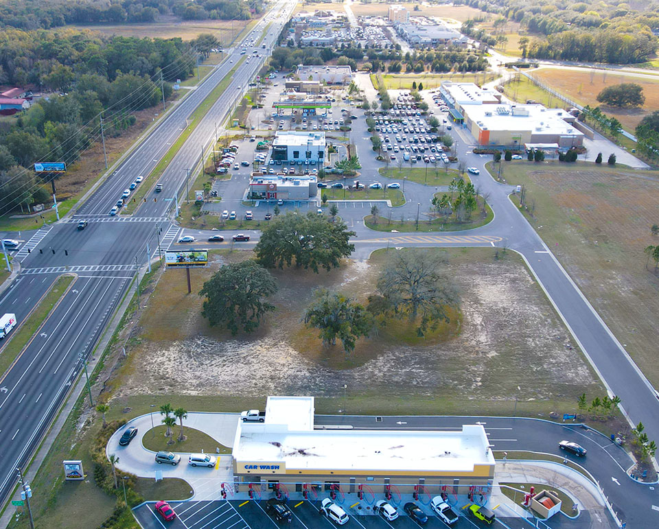 Aerial of Prime Commercial Property on SR 200 near On Top of the World Communities Ocala, FL - Parcel 1 looking west offered by Colen Built Commercial